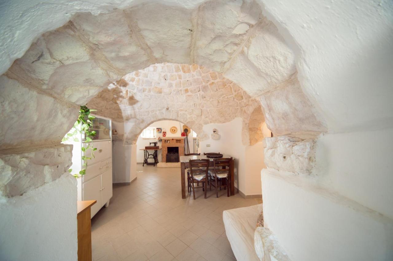 Trulli Girasoli E Viole Cocolicchio Quarto foto
