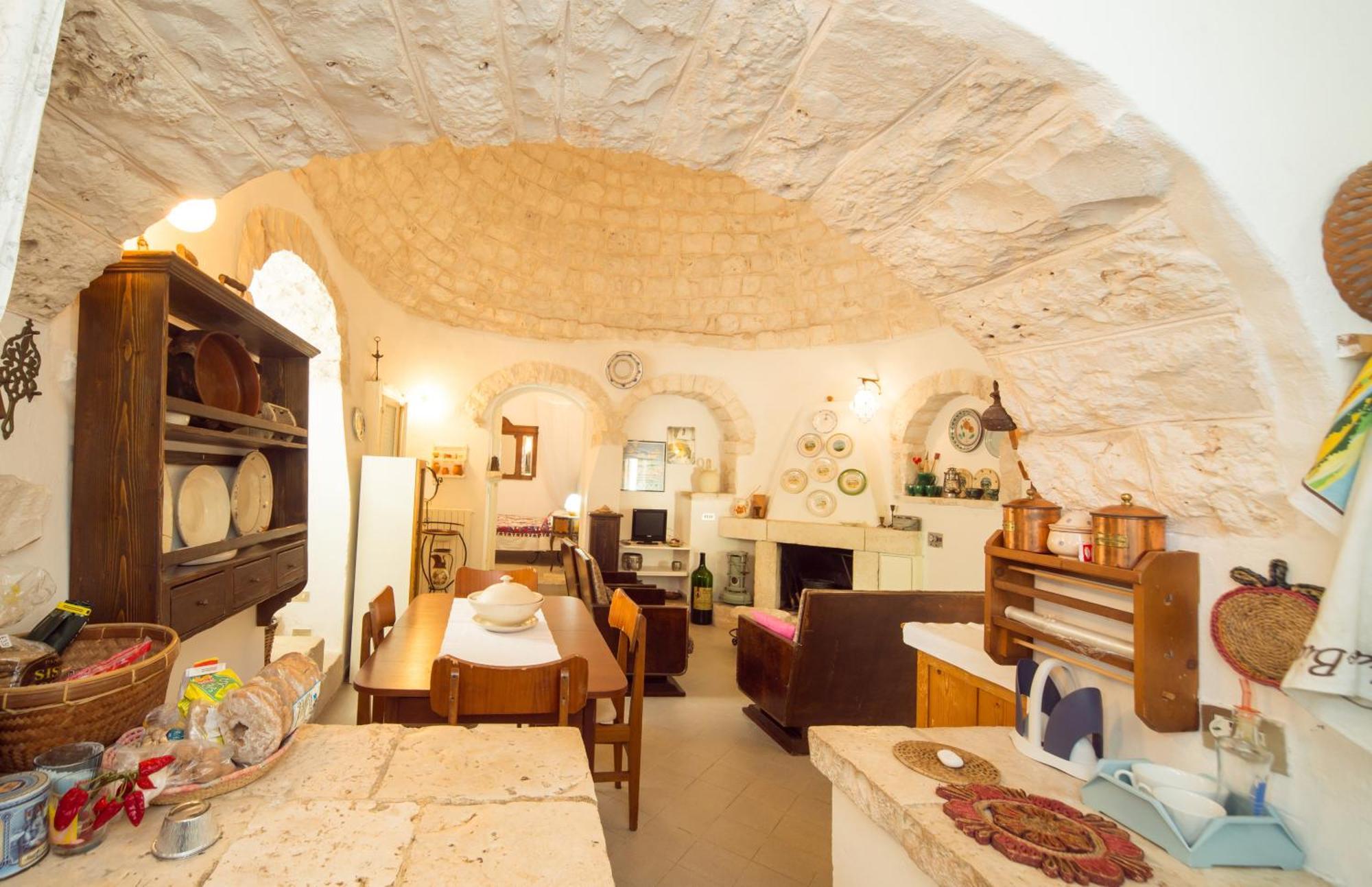 Trulli Girasoli E Viole Cocolicchio Quarto foto